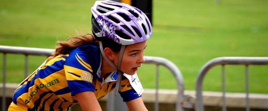 A young Johnstone Wheelers rider racing in club colours